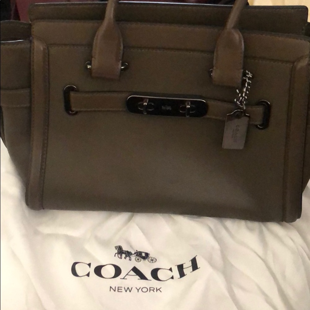 Coach handbag with strap